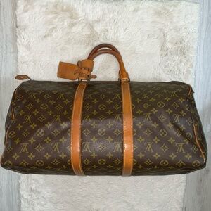 Authentic Louis Vuitton keepal 50 monogram travel bag preowned.